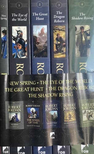Cover of The Wheel of Time. Books 0-4 set. New Spring, The Eye of the World, The Great Hunt, The Dragon Reborn, and The Shadow Rising. Robert Jordan
